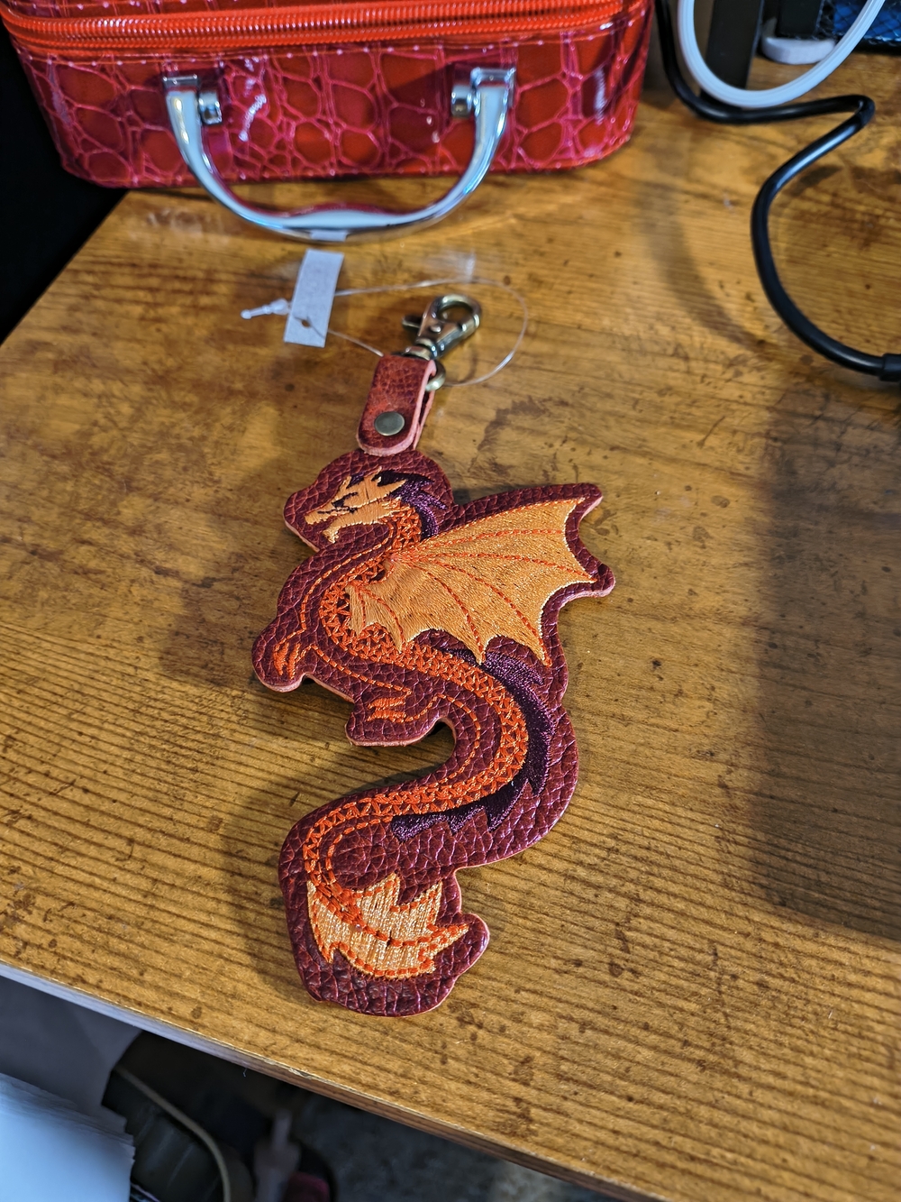 Portland Leather Purply Red and Orange Embroidered Dragon Key Fob
